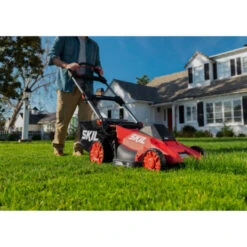 SKIL 40V Grasmaaier Brushless 49cm Incl. 5.0Ah Accu + Snellader 14 SKIL 40V Grasmaaier Brushless 49cm Incl. 5.0Ah Accu + Snellader -Tuinonderhoud buiten 123 3403